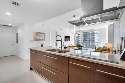 a kitchen with a sink and a counter top at Amazing 1bed at The W icon brickell in Miami