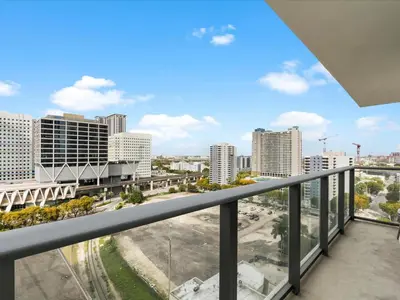 a balcony with a view of the city at Central Downtown Condo - Rooftop Pool Access in Miami