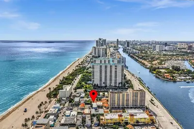 an aerial view of a beach with a red marker at Santorini Blu Elegant 1BR Beach Retreat On the Beach in Hollywood