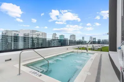 a hot tub on the roof of a building at Central Downtown Miami at District 225 Luxury Residence in Miami