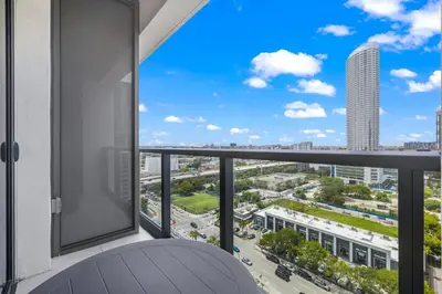 a balcony with a view of a city at Brickell Condos by Vibras Concierge in Miami
