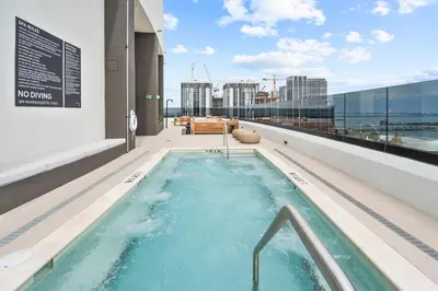a hot tub on the roof of a building at Prime Location Condo at District 225 Downtown in Miami