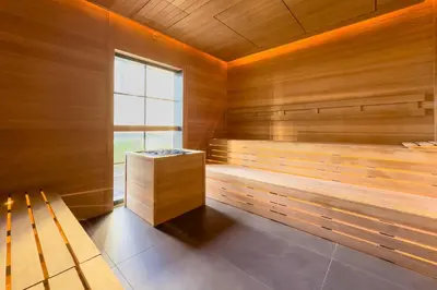 a sauna with a bench and a window at 4906 Cityline Penthouse Studio with Balcony a Pool and Gym in Miami Downtown in Miami