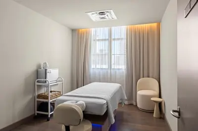 a hospital room with a bed and a window at 4905 Corner Penthouse with Sunset Views a Pool and Gym in Downtown Miami in Miami