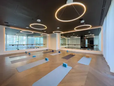 a yoga room with white mats on the floor at 4905 Corner Penthouse with Sunset Views a Pool and Gym in Downtown Miami in Miami