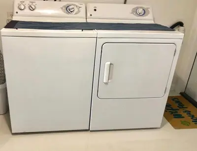 a white stove top oven sitting in a kitchen at Florida Cozy Home!!! in Hallandale Beach