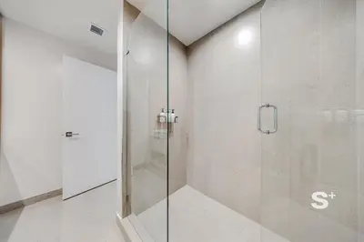 a shower with a glass door in a bathroom at Spacious & Elegant 1BD Apt in Miami in Miami
