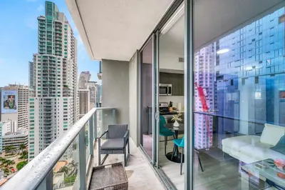 an apartment balcony with a view of a city at Sublime Views Studio in Miami
