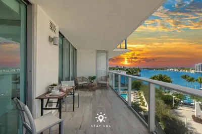 a balcony with a view of the ocean at Luxury Coastal Escape Balcony views - Free Parking in Miami Beach