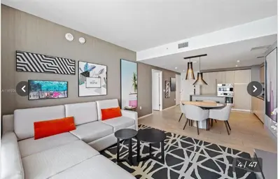 a living room with a couch and a table at Hyde house 3507 AL MAR in Hollywood