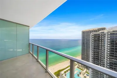 a balcony with a view of the ocean at Lux Beachfront Retreat at Hyde Resort w OceanView in Hollywood