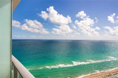 a view of the ocean from a balcony at Lux Beachfront Retreat at Hyde Resort w OceanView in Hollywood