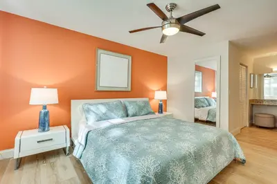 a bedroom with a bed and a ceiling fan at Resort Condo By Aventura Mall! Gated Community in Aventura