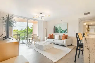a living room with a couch and a table at The Yacht Club at Aventura Miami 4405 in Aventura