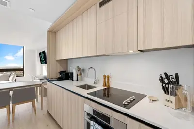 a kitchen with a sink and a counter top at Well-Located Condo with Free Parking and Amenities in Miami