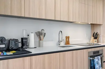 a kitchen with a sink and a counter top at Well-Located Condo with Free Parking and Amenities in Miami