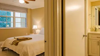 a bedroom with a bed and a window at The Yacht Club at Aventura Miami 3405 in South Island