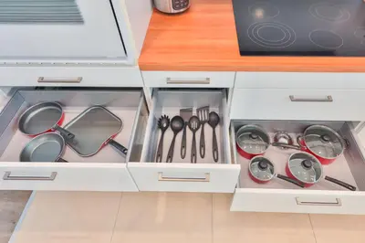 a kitchen drawer filled with utensils and utensils at Family Grand Advantage in Hollywood