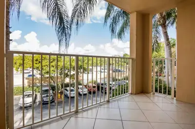 a balcony with a view of a parking lot at The Yacht Club at Aventura Miami 6307 in South Island