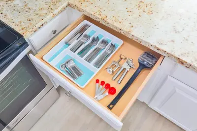a drawer in a kitchen with some utensils at Family Poolside Palm Retreat with Jacuzzi in Hollywood