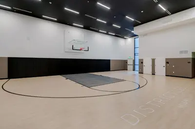 an empty gym with a basketball hoop and a basketball court at Downtown Edit-Resort Style Stay with Full Amenities in Miami