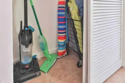 a room with a vacuum cleaner and a broom at Condo with Stunning View STR-01307 in Sunny Isles Beach