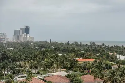 an aerial view of a city with palm trees at Condo on the Beach-STR 01309 in Sunny Isles Beach