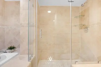 a shower with a glass door in a bathroom at Luxury by the Sea- 2BR Pool & Gym -Hollywood in Hollywood