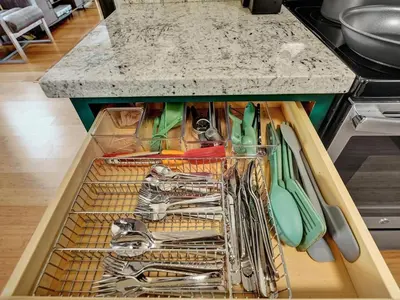 a drawer full of utensils on a kitchen counter at Holiday Home 2BR - 2 bath Beheizter Pool- Familien-Haustierfreundlicher Spaß by Interhome in Fort Lauderdale