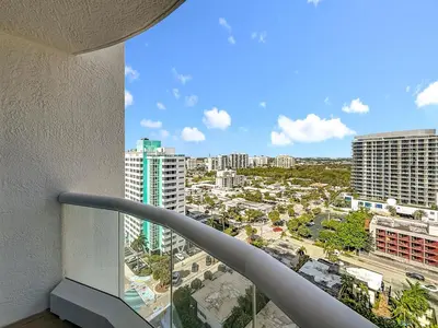 a balcony with a view of a city at Fort Lauderdale Beach Luxury - Ocean View Condo in Fort Lauderdale
