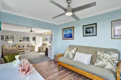 a living room with a couch and a table at Fort Lauderdale Waterfront Condo! Pool and Marina Views in Fort Lauderdale