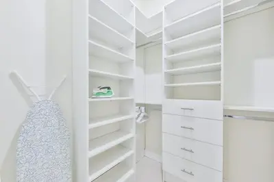 a white walk in closet with a dress in it at Supremacy Villa STR-6110 in Davie