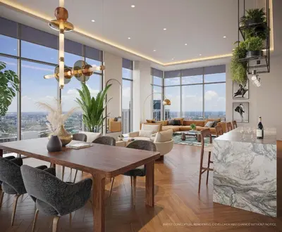 a dining room and living room with a table and chairs at Premium High-Rise Living at 501 First - Downtown Miami in Miami