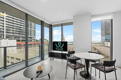 a room with a table and chairs and windows at Premium High-Rise Living at 501 First - Downtown Miami in Miami