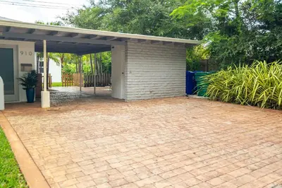 a brick patio in front of a house at Serene Cottage Retreat Ideal for Couples & Solo Travelers in Miami