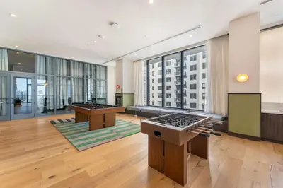 a large room with two billiard tables in a building at Crosby Miami WTC 2BR 2BA Corner City Residence #601 in Miami