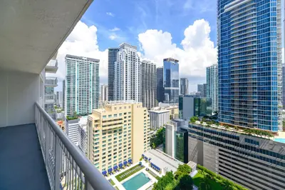 a view of a city skyline from a balcony at Brickell Stay with City Views in Miami