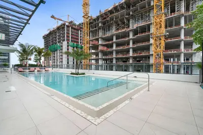 a swimming pool in a building under construction at Sky Sanctuary with Rooftop Pool & Hot tub in Miami