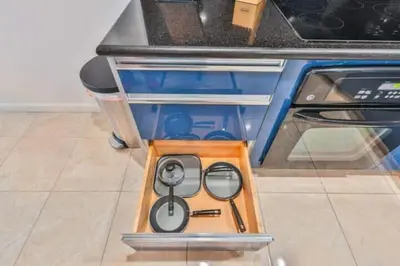a drawer with a pair of glasses and scissors at Introdused by Ocean Reserve free parking STR-02559 in Sunny Isles Beach