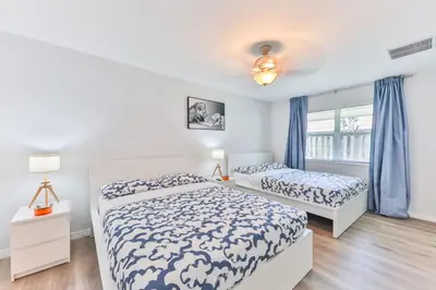 a bedroom with two beds and a window at Fantastic Family Nest for Joy STR-2310#1 in Fort Lauderdale