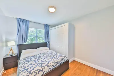 a bedroom with a bed and a window at Hard Rock Family House in Fort Lauderdale