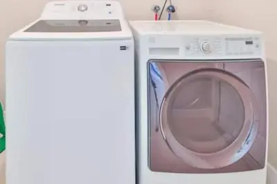 a white washing machine next to a white washer at Cruise Family house STR-1761 in Fort Lauderdale