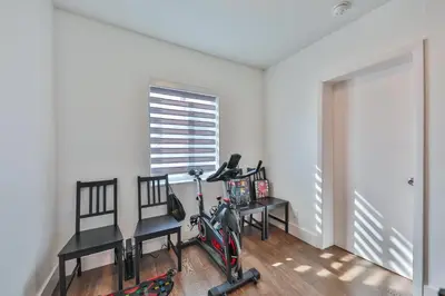 a home gym with a bike parked in a room at Jungle Happiness Villa STR-2651 in Hollywood