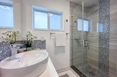 a white bathroom with a sink and a shower at Jungle Happiness Villa STR-2651 in Hollywood