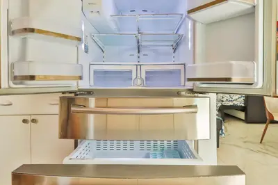 a kitchen with an open oven in a kitchen at Classy Family Stylish Swimming Joy in Hollywood