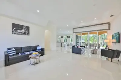 a large living room with couches and tables and chairs at Luxury Family Davie Rancho STR-6114 in Davie