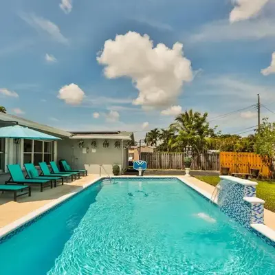 Hollywood Tropical Paradise vibe waterfall pool villa