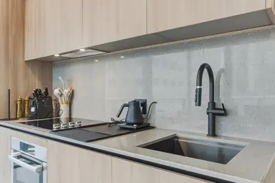 a kitchen counter with a sink and a mixer at City View Condo - Prime Downtown Miami in Miami
