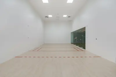 an empty room with white walls and a wooden floor at City Atelier -Sauna Pool Parking in Miami