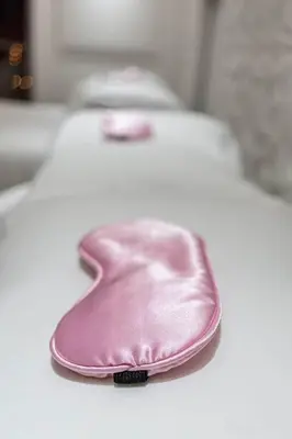 a pink purse sitting on top of a table at Versace Mansion Neighbor (Floors 2 & 3) Sleeps 12 in Miami Beach